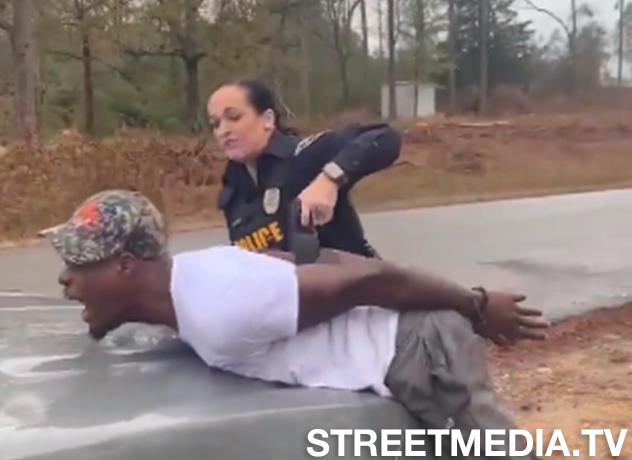 Deputy Dana Elmore Arresting Micah Washington For A Flat Tire